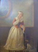 A 19thC oil on panel of a lady in period dress with spaniel beside,