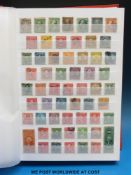 A large stockbook of mainly USA stamps with many early issues together with other foreign and