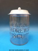 A vintage Meredith and Drew Ltd. glass biscuit barrel.