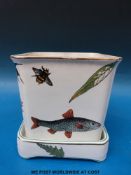 A Minton floral jardiniere and stand