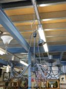 A pair of pink glass and wirework electric lights and one other