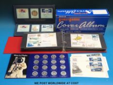 A box of RAF and Space covers and coin packs