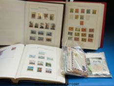A good collection of Papua and New Guinea mint stamps in three albums 1900-2007.