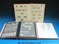 Three stock books of stamps, Canada, Australia and East Africa,