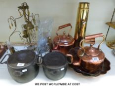 Two vintage cooking pots marked AGA, two copper kettles, copper shell shaped mould,