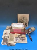 A Underwood & Underwood stereoscope with turned handle and engraved decoration to the eye piece,