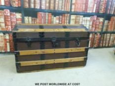 An ash bound dome topped travelling trunk (W77 x D42 x H50cm)