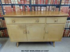 An Ercol light elm sideboard (W122 x D46 x H83cm)