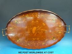 An inlaid mahogany oval tray (max diameter 68cm)