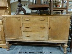 A light oak sideboard in the Arts & Crafts / Gordon Russell style (W152 x D56 x H94cm)