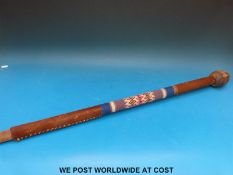 A knobkerrie with bulbous top,