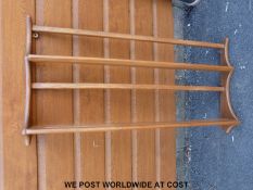 An Ercol plate rack (width 97cm)