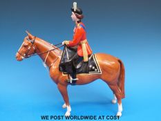 A Beswick figure The Queen on Imperial