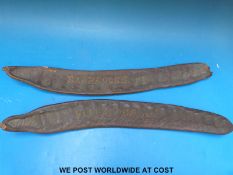 Two Locust bean pods with script to one side 'Barbadoes 1920'
