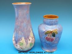 Two Royal Doulton vases, one with cherry design (17cm tall),