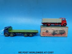 Two Dinky Supertoys diecast model lorries, Guy 4-ton lorry 511 with red cab,