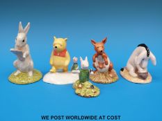 Five Royal Doulton Winnie the Pooh figures to include Piglet, Kangaroo, Eeyore's Birthday,