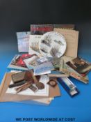 A box of books, commemorative plate and general memorabilia relating to S.S.