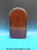 A mahogany shove ha'penny board with adjustable markers