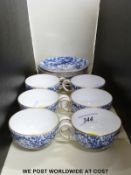 A Crown Derby part tea service with peacock design,