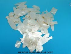 A Chinese mother of pearl counters in the shape of fish,