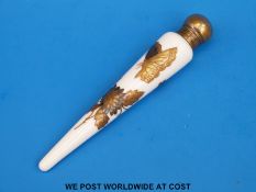 A porcelain scent bottle with two colour gold gilding and metal stopper (15.