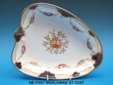 A hand decorated Wedgwood dish (length 25cm)