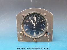 A Smiths circa 1950's v308 military 8 day aircraft cockpit clock with time of trip function,