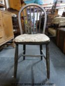 Four elm seated wheel back Windsor kitchen chairs