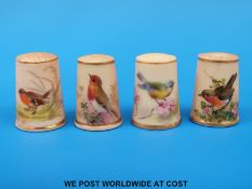 Four Royal Worcester thimbles hand decorated with birds (unmarked)