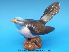 A Beswick Cuckoo (13cm tall)