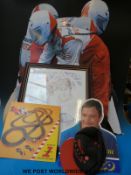 A quantity of point of sale stand up cardboard cut out motor racing figures