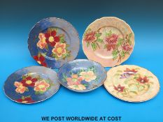 Four Doulton Burslem cabinet plates, two decorated with roses,