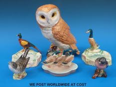 Three Beswick bird ashtrays, a Beswick barn owl,