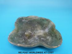 A 19thC Chinese spinach jade pin / ring dish modelled as a lily pad with frog
