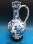 A Chinese blue and white gourd shaped ewer (28.