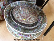 A quantity of large Chinese famille rose bowls and a Chinese famille rose planter (small bowl: D25