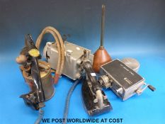 A coach services ticket machine, iron, vintage telephone,