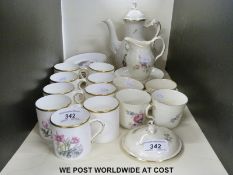 A Royal Worcester coffee set with some extras