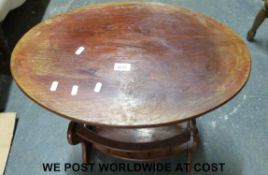 A retro standard lamp and an oak table/magazine rack