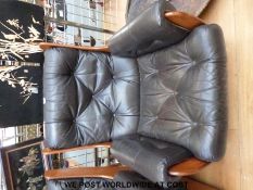 A retro 1960/70s leather and teak three piece suite