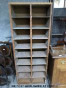 A wooden pigeon hole unit (W58 x D28 x H147cm)