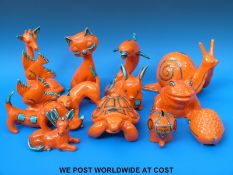 A collection of retro Trentham animal figures including snail and tortoise