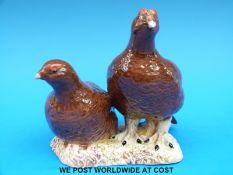 A Beswick model of two grouse impressed 2063 to base