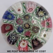 Clichy barber's pole chequer glass paperweight with 17 spaced canes including a signature pink,