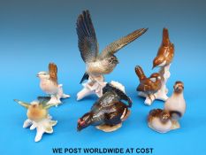 Four Karl Ens bird figures and two Goebel figures (tallest 20cm)