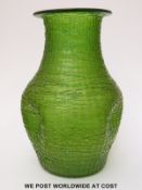 Kralik Threaded iridescent glass vase of bulbous form with dimple knocked sides (23cm tall)