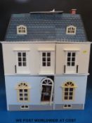 A large furnished doll's house
