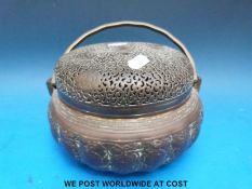 A pierced Japanese lidded pot