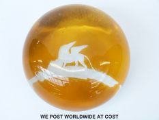 Glass paperweight featuring the Lion of St Mark engraved over an amber flash overlaid ground (8.